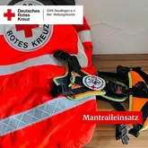 Einsatzjacke der Suchhunde Staffel reutlingen des Deutschen Roten Kreuzes und ein Mantrail Geschirr