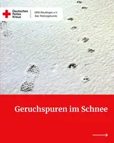 Hundepfoten und Schuhabdrücke im SChnee